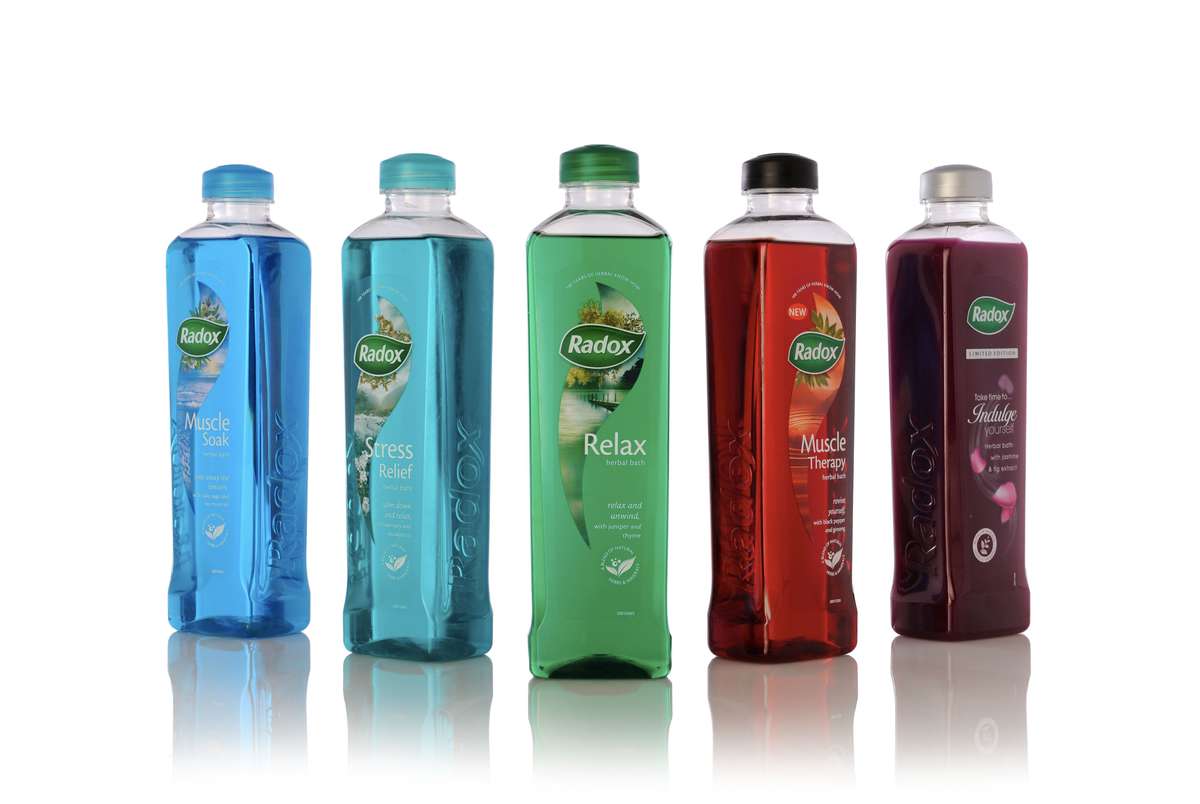 Five Radox shower gel bottles