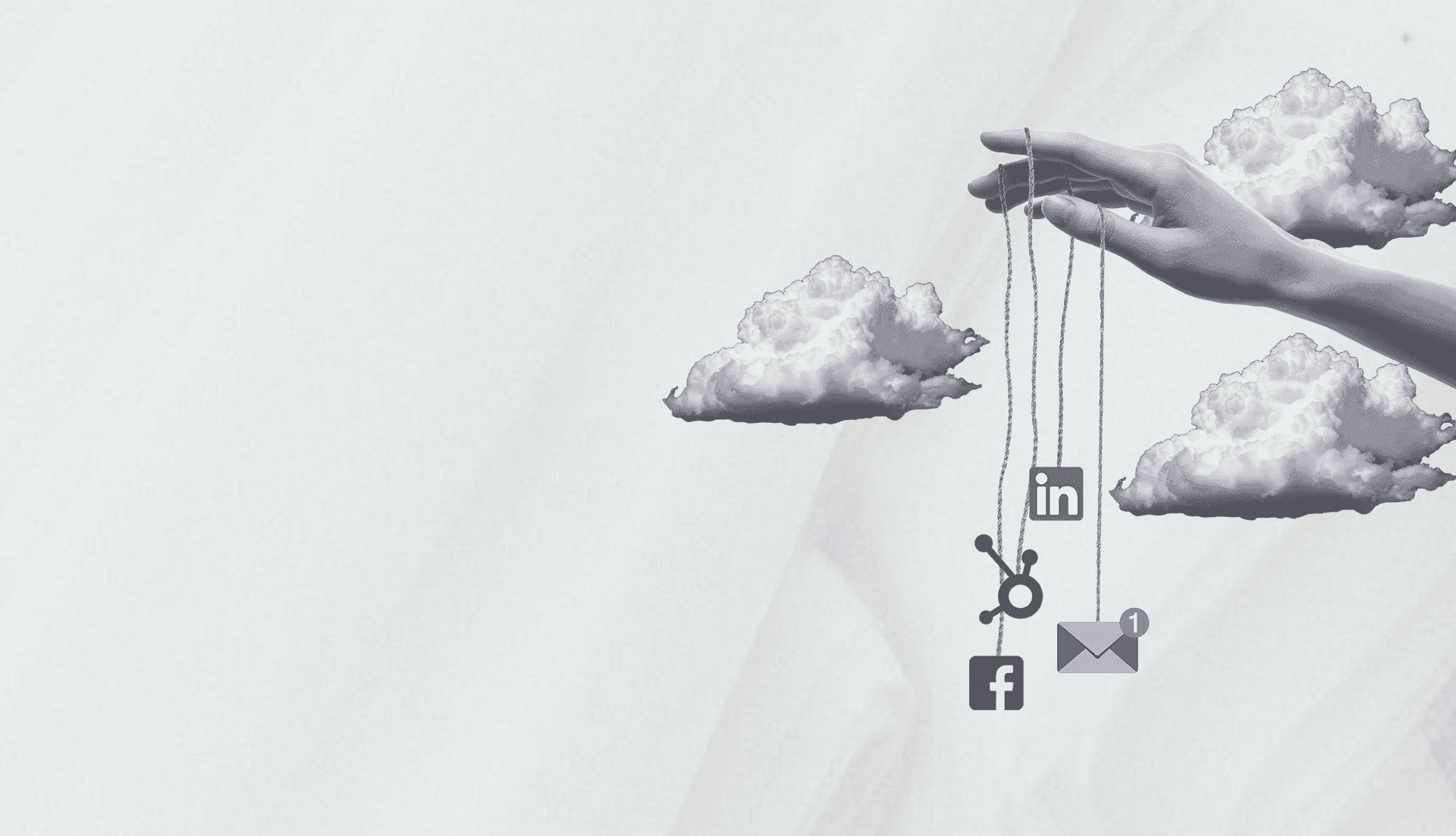 Hubspot, Linkedin, Facebook, Gmail, hanging on string, held by a hand floating amongst clouds.